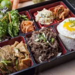 Nikmati Kelezatan Lunch Box di Dosirak Cafe Tongin Market